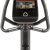 Hometrainer Flow Fitness B5s met groot schermen meerdere apps. Computerscherm met programma's